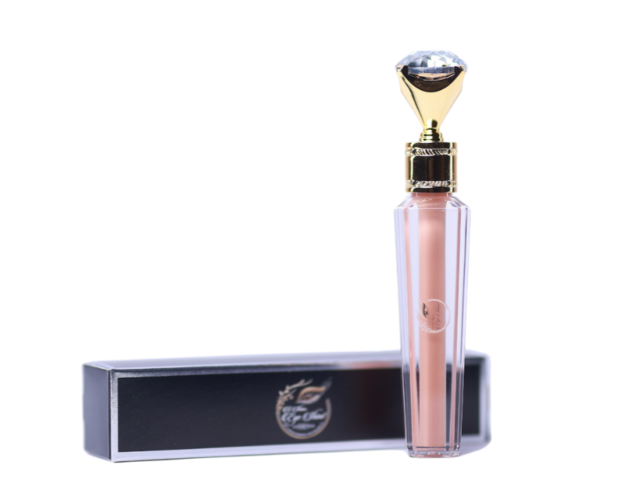 lip gloss box lying horizontally next to lip container vertically