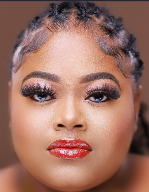 African American model with red lip gloss